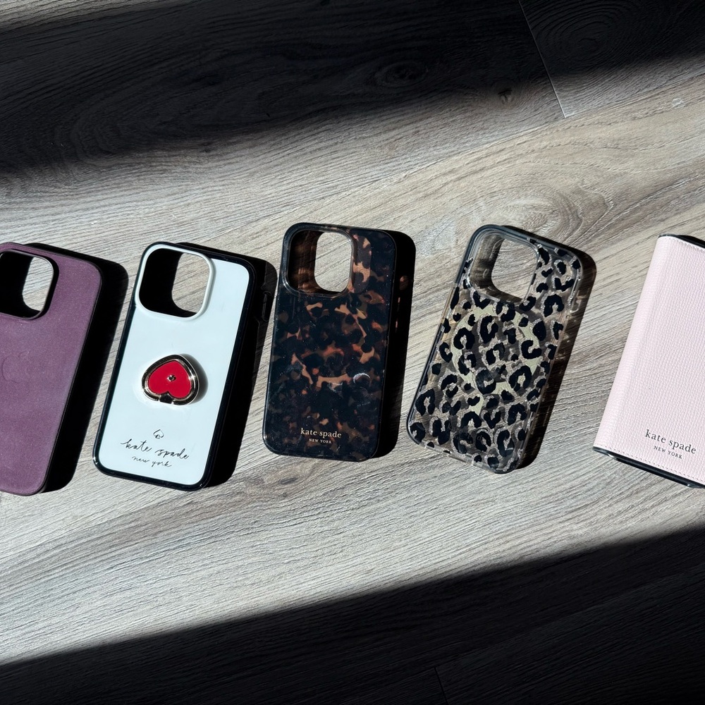 Kate Spade and Apple iPhone 15 pro cases. Total of 6